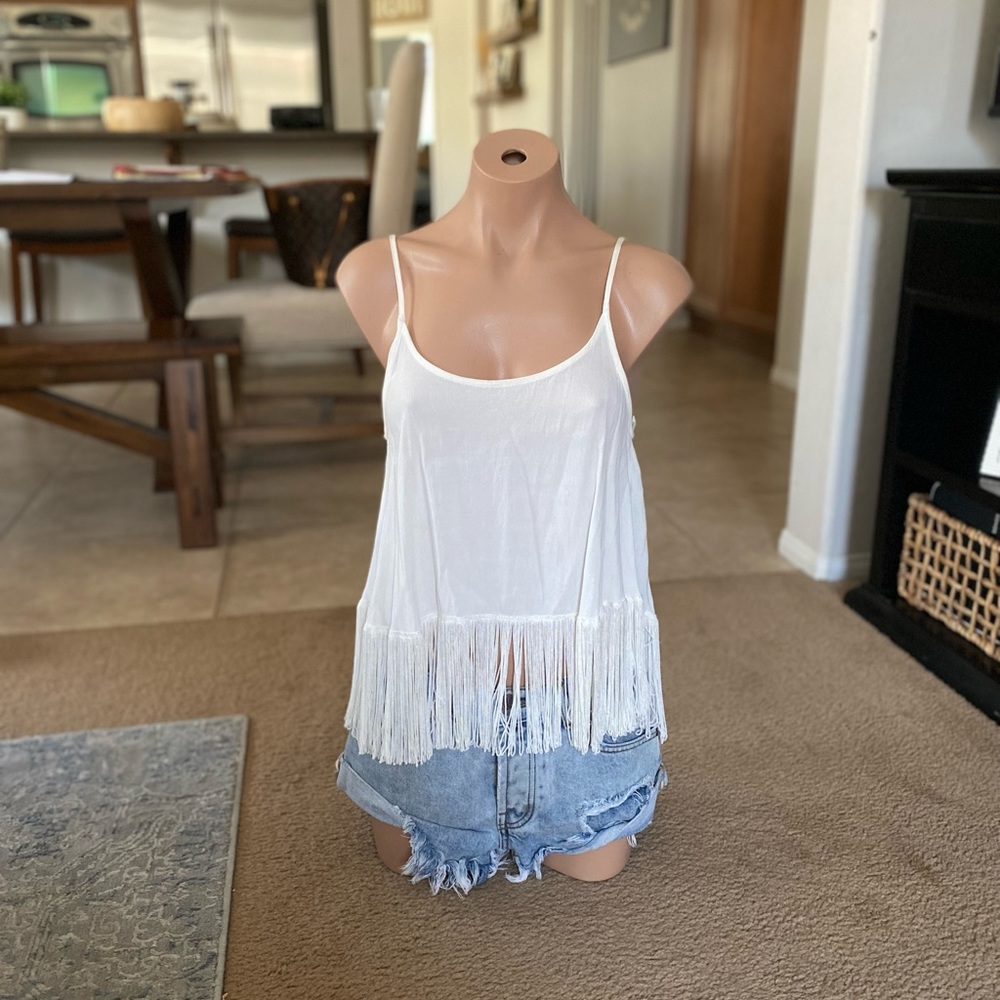 Olivaceous white fringe tank, excellent condition, size Medium.
